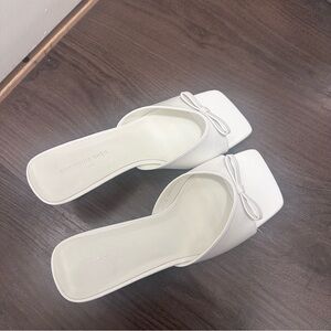 White heeled sandals